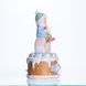 Новогодняя декоративная фигурка с подсветкой 10.5&times;10.5&times;20.5 см Новогодний декор Ребёнок на "сладкой башне" из фарфора CR-6-14
